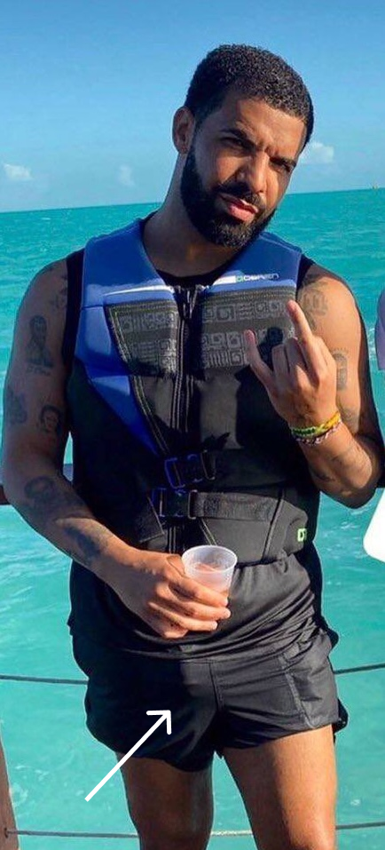Drake in shorts on a boat showing visible bulge - the viral drake dick photo